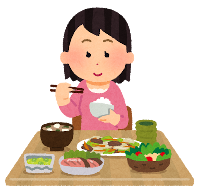 ご飯を食べる女性
